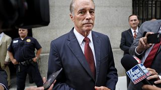 Image: Rep. Chris Collins, R-N.Y., leaves court after a pre-trial hearing i