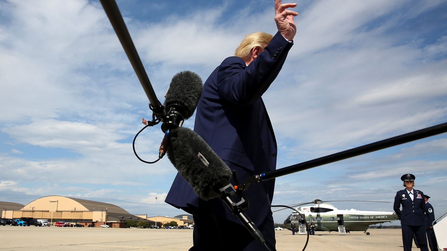 Image: U.S. President Trump turns to walk away after speaking to reporters 