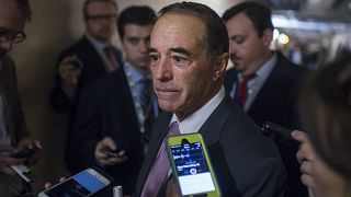 Rep. Chris Collins, R-N.Y., leaves a meeting of the House Republican Confer