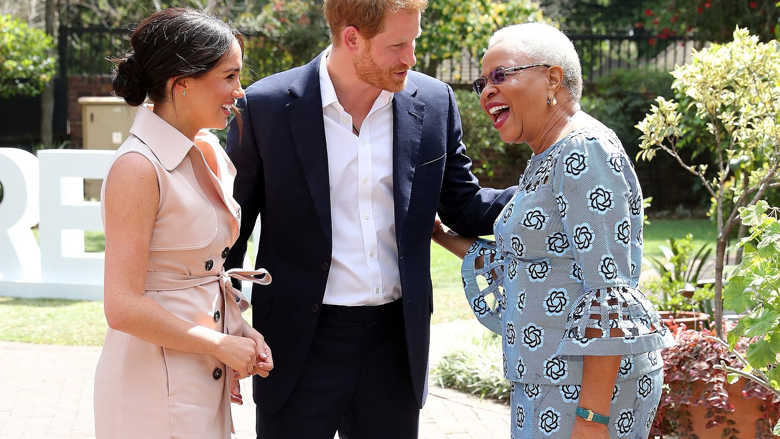 Image: Britain's Prince Harry and his wife Meghan