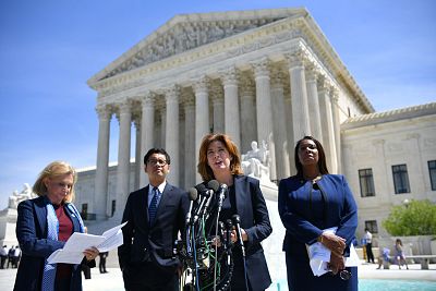 Director of the Census for New York City Julie Menin speaks to reporters outside of the US Supreme Court on April 23, 2019. From left are: Rep. Carolyn Maloney, D-NY, ACLU\'s Voting Rights Project Director Dale Ho, Menin, and  New York Attorney General Letitia James.