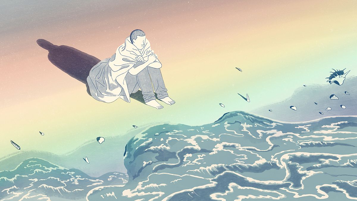 Illustration of man sitting on the ocean's edge with a rainbow projected on
