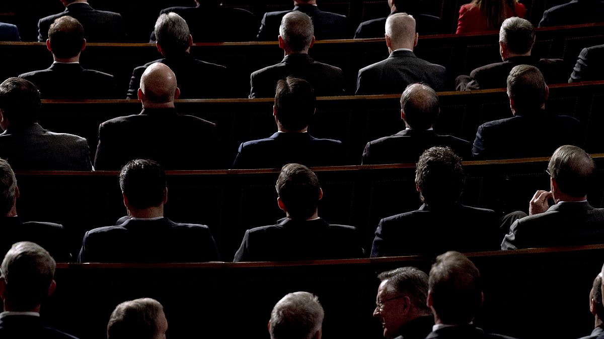 Image: Members of Congress listen as President Donald Trump delivers the St