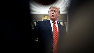 Image: President Donald Trump speaks to reporters in the Oval Office on Sep