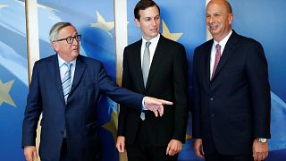 EU Commission President Juncker poses with White House senior adviser Kushn