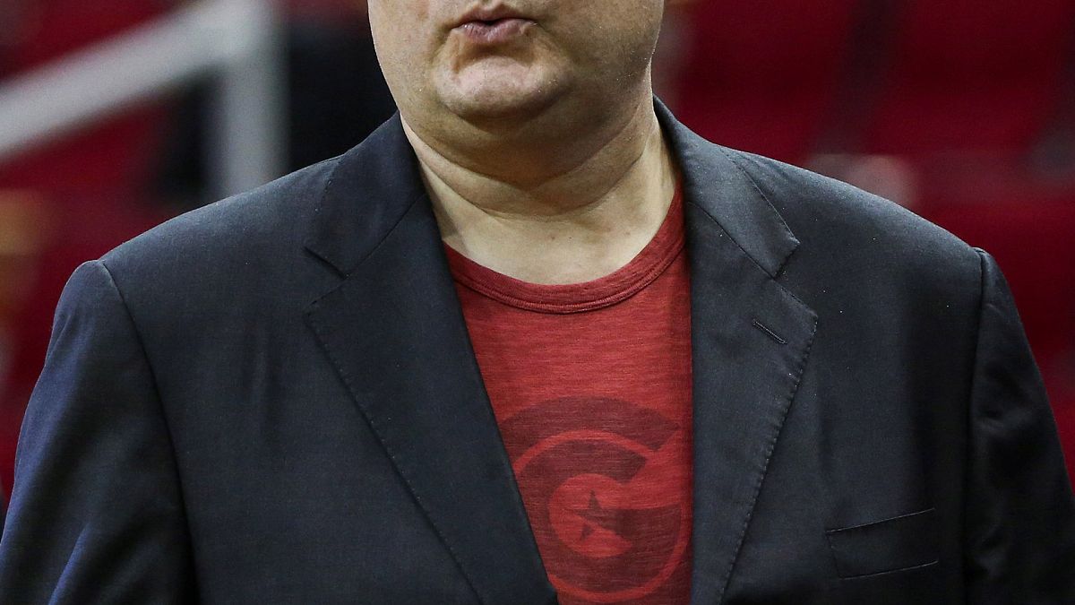 Image: Houston Rockets general manager Daryl Morey looks on before a game b