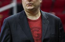 Image: Houston Rockets general manager Daryl Morey looks on before a game b