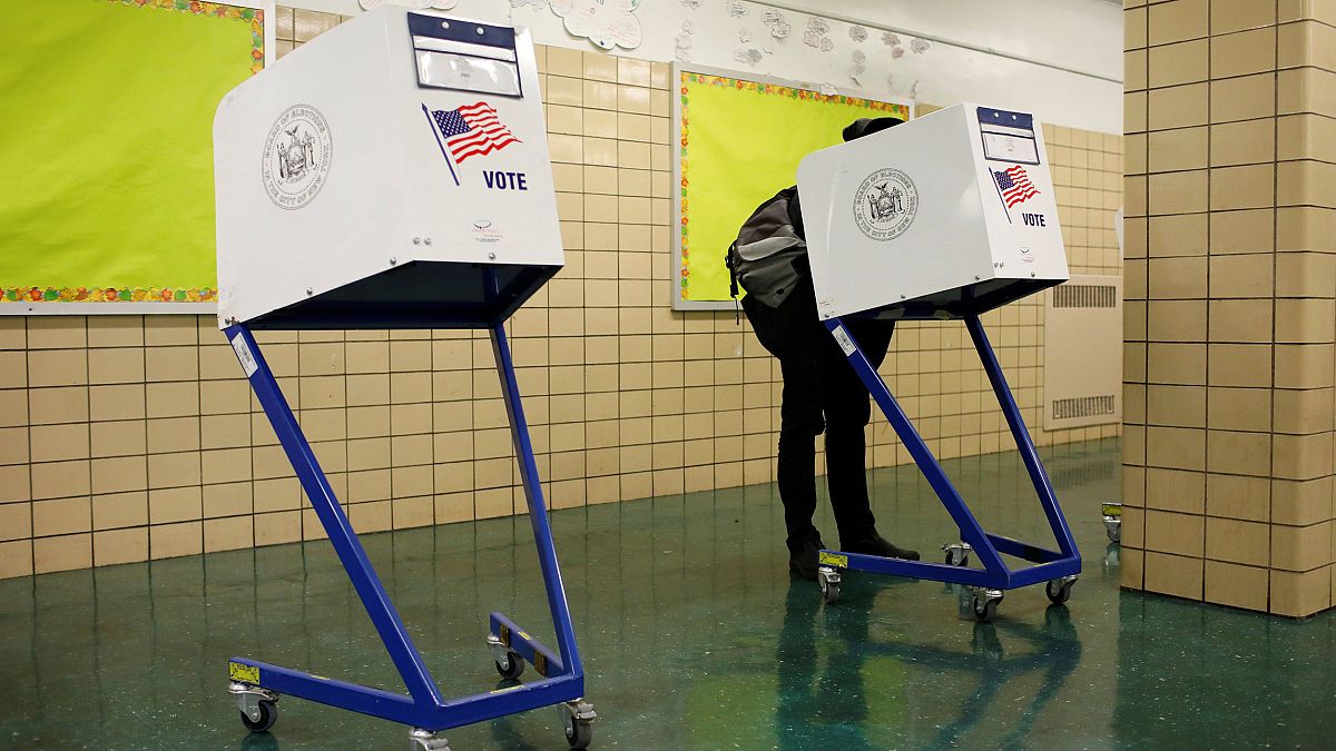 Image: Person votes during the midterm election at P.S. 140 in Manhattan, N