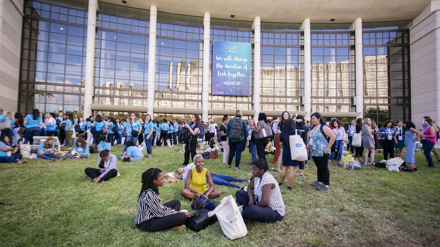 Attendees enjoy a break outside the convention center where the Grace Hoppe