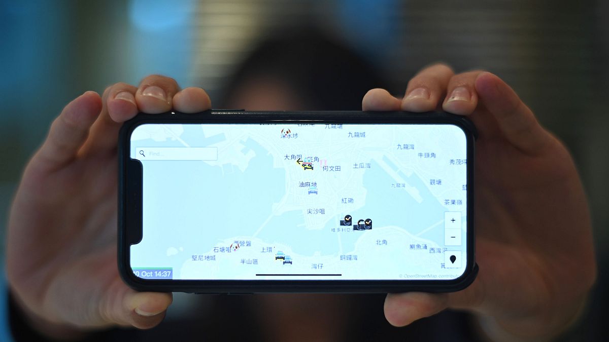 Image: A smartphone displaying the "HKmap.live" app in Hong Kong on Oct. 10