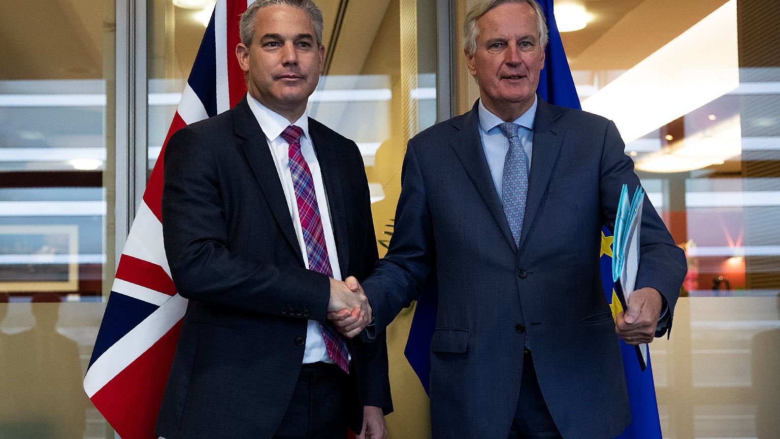 Britain's Brexit Secretary Barclay poses with EU's chief Brexit negotiator 