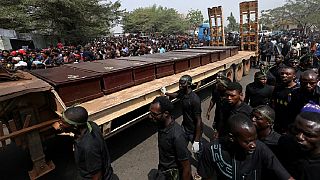 Nigeria holds mass burial for 73 people killed in communal violence