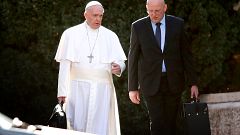 Image: Pope Francis walks with head of security Domenico Giani near Rome on