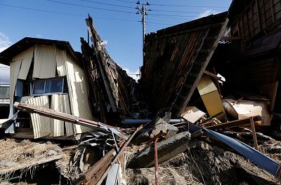 Destroyed houses are seen, in the aftermath of Typhoon Hagibis, in Koriyama, Fukushima prefecture, Japan Oct. 15, 2019.