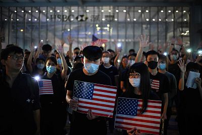 Protesters on Monday call on U.S. politicians to pass a bill that could alter Washington\'s relationship with Hong Kong.