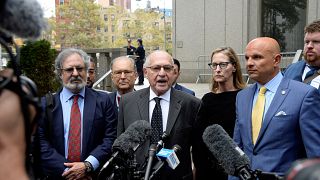 Image: Alan Dershowitz and his legal team, including Howard Cooper, wife Ca