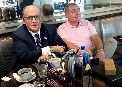 Rudy Giuliani has coffee with Ukrainian-American businessman Lev Parnas at the Trump International Hotel in Washington on Sept. 20, 2019.