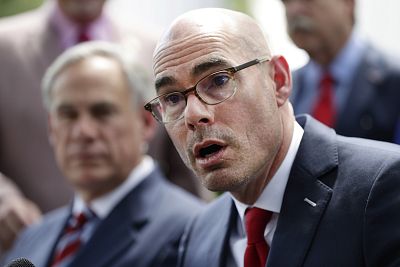 Texas House Speaker Dennis Bonnen, right, with Governor Greg Abbott, left, speaks at a news conference at the Texas Governor\'s Mansion in Austin, Texas on May 23, 2019.