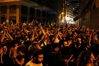 People gesture during a protest over deteriorating economic situation in Beirut, Lebanon on Oct. 17, 2019.