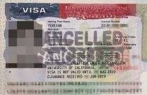 A "cancelled" stamp can  be seen on a U.S. visa provided by an Iranian stud