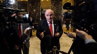 Image: Rudy Giuliani speaks to reporters at Trump Tower in New York on Jan.