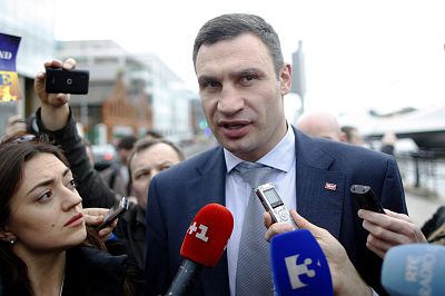 Vitali Klitschko, former heavyweight boxing champion and Ukrainian politician, speaks to the media while walking through Dublin on March 6, 2014.
