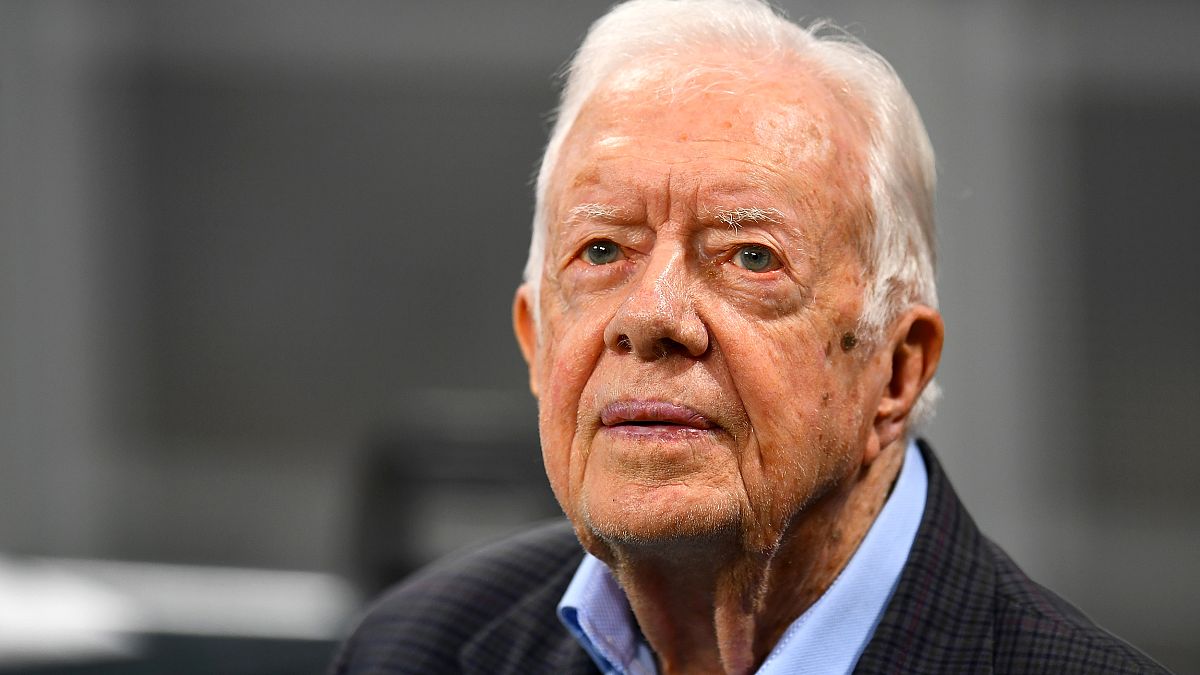 IMage: Jimmy Carter attends a football game in Atlanta on Sept. 30, 2018.