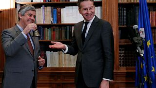 Incoming Eurogroup president Mario Centeno (left)