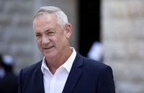 Image: Blue and White Party leader Benny Gantz leaves after paying tribute