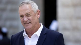 Image: Blue and White Party leader Benny Gantz leaves after paying tribute