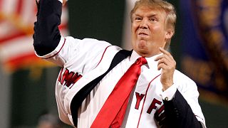 FILE PHOTO: Trump throws the first pitch before the start of the second gam