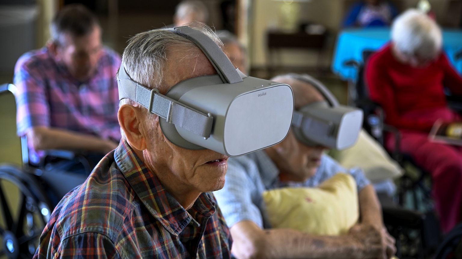 Image: Jim Halsey watches nature scenes through a virtual reality device at