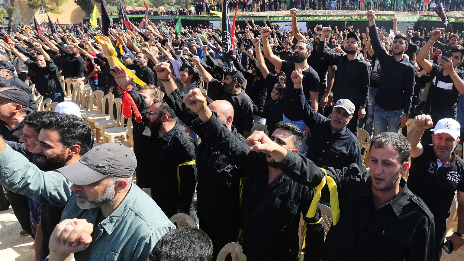 Image: Supporters of Lebanon's Hezbollah leader Sayyed Hassan Nasrallah ges
