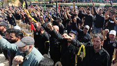 Image: Supporters of Lebanon's Hezbollah leader Sayyed Hassan Nasrallah ges