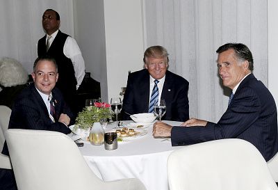 President-elect Donald Trump sits at a table with Former Governor of Massachusetts Mitt Romney and Reince Priebus, left, at Jean Georges Restaurant on Nov. 29, 2016 in New York.