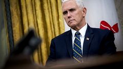 Image: Vice President Mike Pence listens during a meeting in the Oval Offic