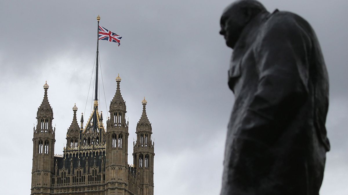 Image: A Union flag flies over the Houses of Parliament in central London o