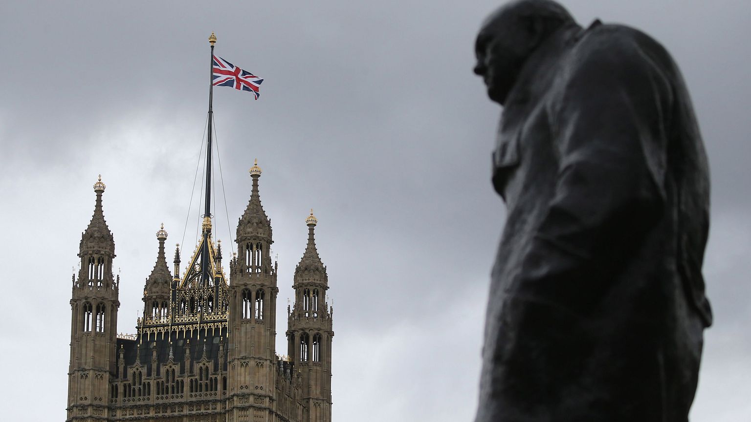 Image: A Union flag flies over the Houses of Parliament in central London o