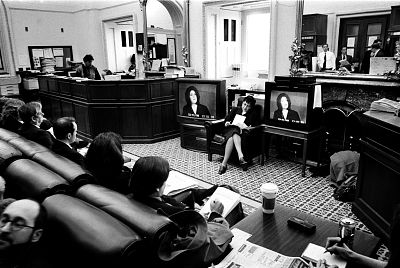 Reporters listen to Monica Lewinsky\'s testimony during the Senate impeachment trial of President Bill Clinton in 1999.