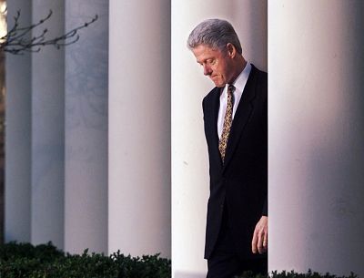 President Clinton walks to the podium to deliver a short statement on the impeachment inquiry in the Rose Garden of the White House in Washington on Dec. 11, 1998.