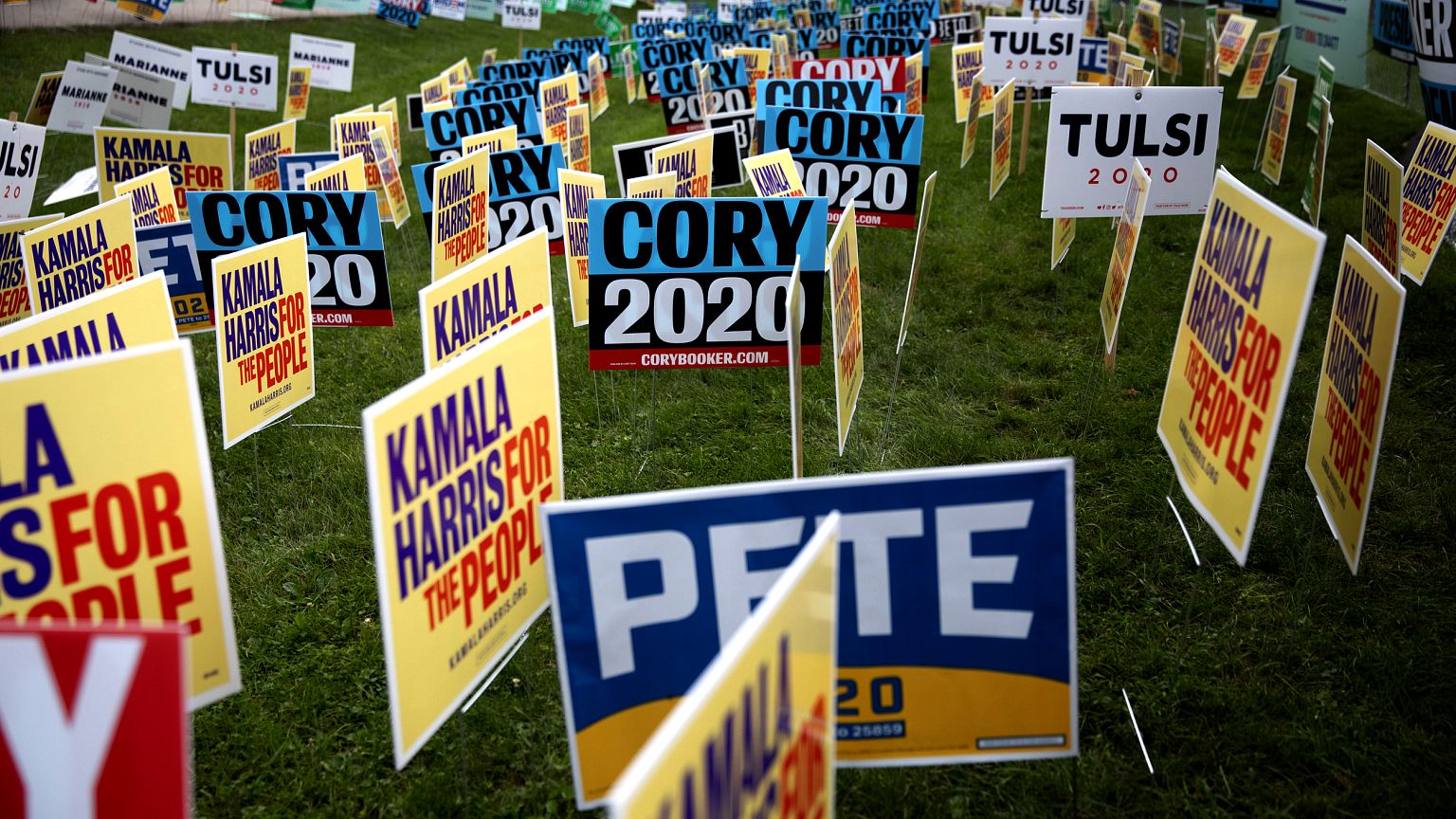 Image: Democratic presidential candidate signs at the Polk County Steak Fry