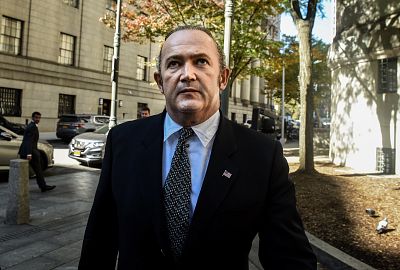 Igor Fruman exits federal court after an arraignment hearing in New York on Oct. 23, 2019.