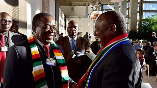 Ramaphosa, Mnangagwa bedazzle Davos delegates with 'national' scarves