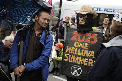 Extinction Rebellion protesters block roads in central London on Oct. 7 as part of a wide-ranging series of global demonstrations demanding new climate policies.