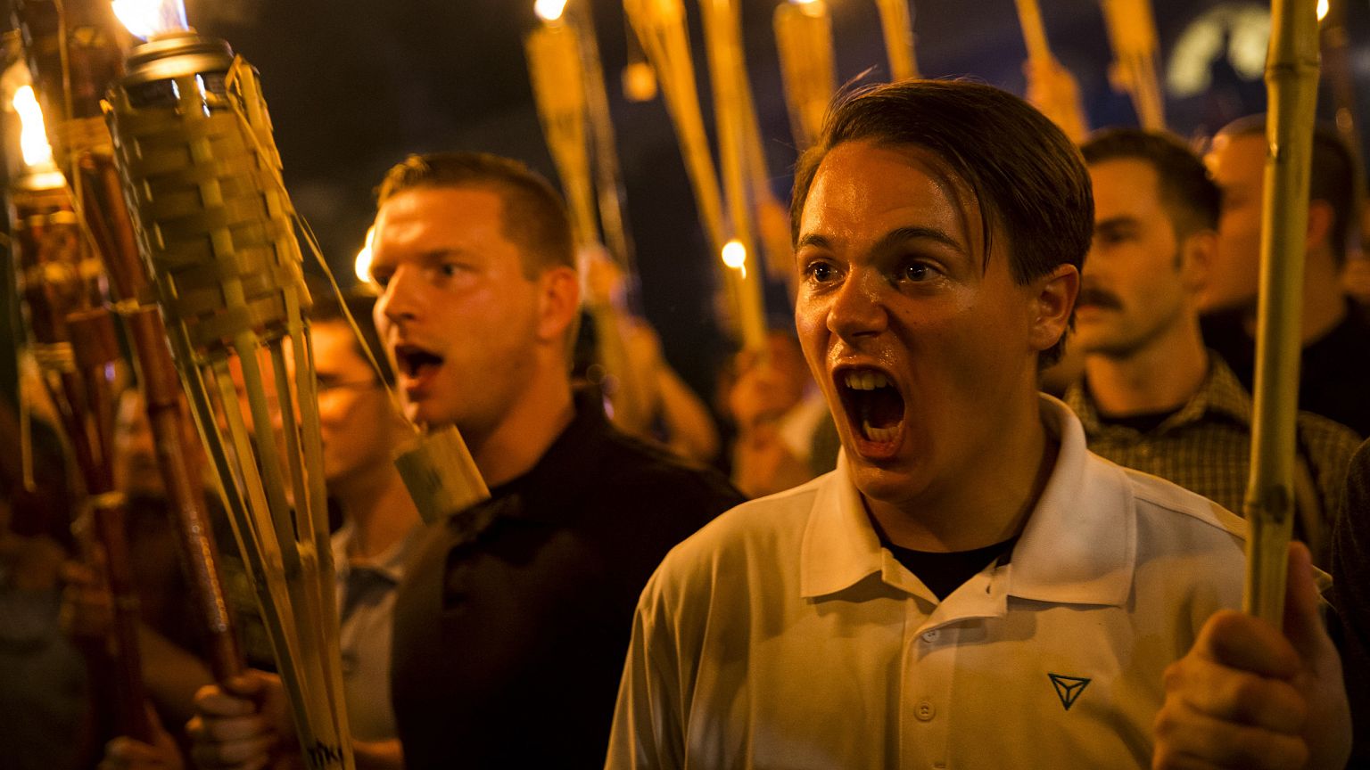 Image: Neo Nazis, Alt-Right, and White Supremacists encircle and chant at c