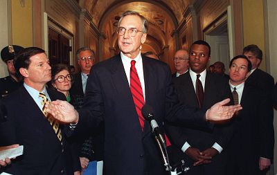 Rep. Robert Livingston, R-LA, speaks to reporters on Dec. 17, 1998, two days before he announced he would be resigning from Congress.