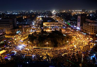 Demonstrators protest in Tahrir square, Baghdad, on Tuesday. 