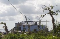 Two months after Dorian, debris poses critical health risks for Bahamians