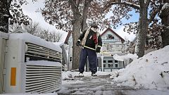 Image: Tom Jacobson shovels snow in Madison, Wis., on Nov. 11, 2019.