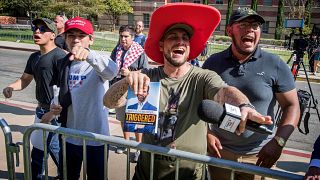 Image: Supporters of President Donald Trump yell at counter protesters outs